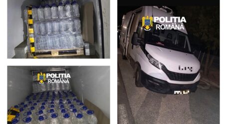 FOTO. O dubă plină de pălincă, depistată într-un sat din Sălaj. Polițiștii au confiscat mașina și 2.000 de litri de băutură